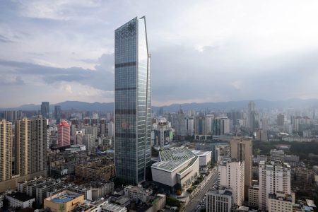 A drone photo showcasing the iconic landmark tower at Hang Lung Spring City 66 in Kunming, China.
